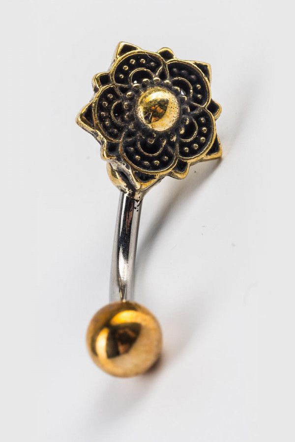 Пирсинг в пупок Ревари